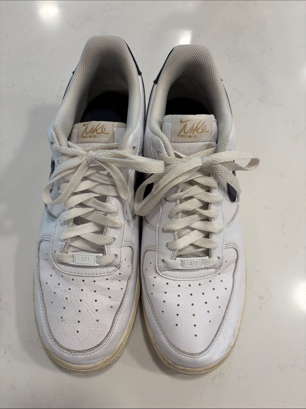Nike White AF1  Low-Top Sneakers with Navy Swoosh